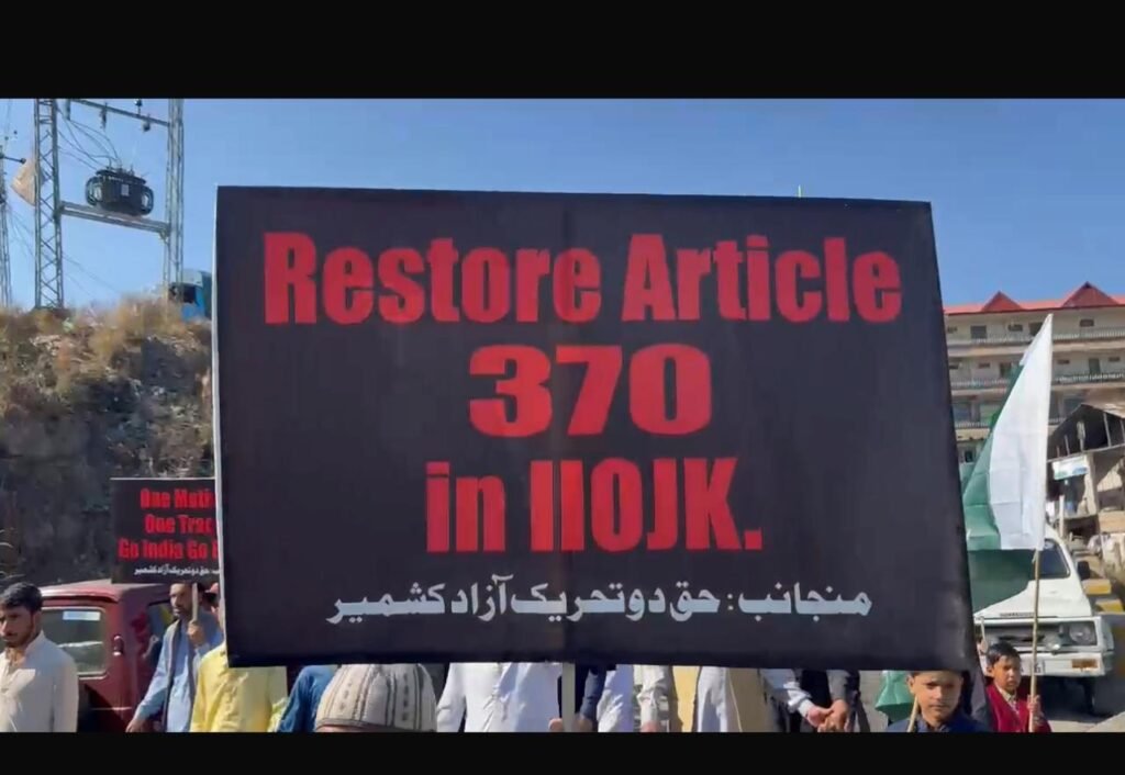 The rally moved through the Khai Gula market, with participants raising slogans that underscored their dedication to achieving justice and fulfilling the martyrs' dream of freedom and unity. **Images of the rally are attached, capturing the powerful presence and solidarity displayed by thousands of participants as they marched in honor of the Jammu martyrs.**